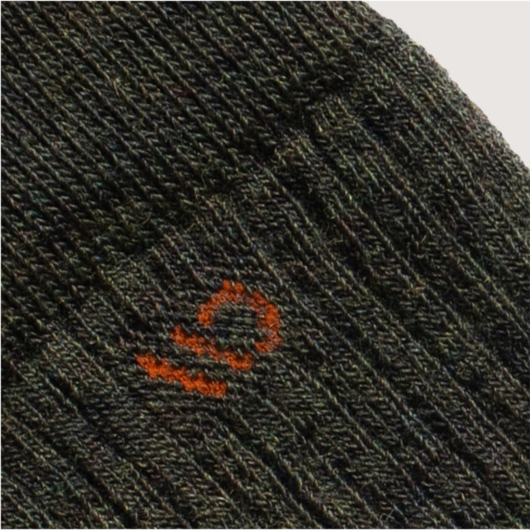 Detail featuring an orange logo and forest green body --Forest