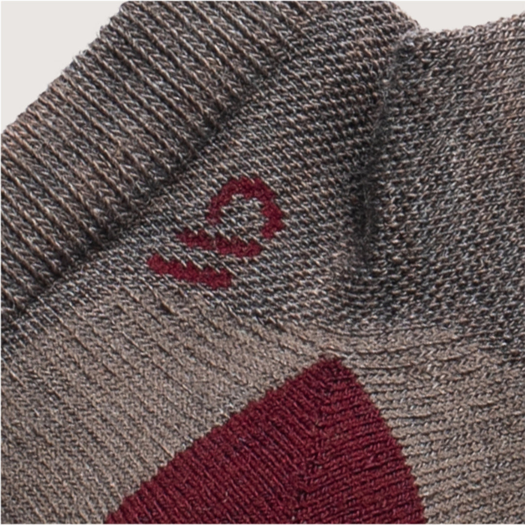 detail image of 9500 Taupe, featuring a maroon logo and heal, with solid taupe body