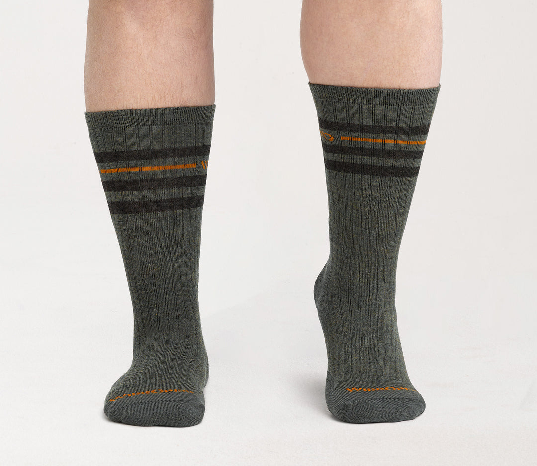 On model of Forest Crews with orange logo, forest body, black stripes under cuff --Forest