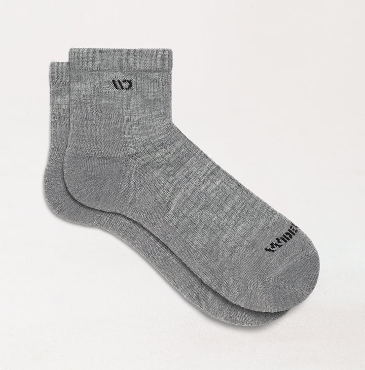 Socks laying flat with  Gray body and black logo--Light Gray