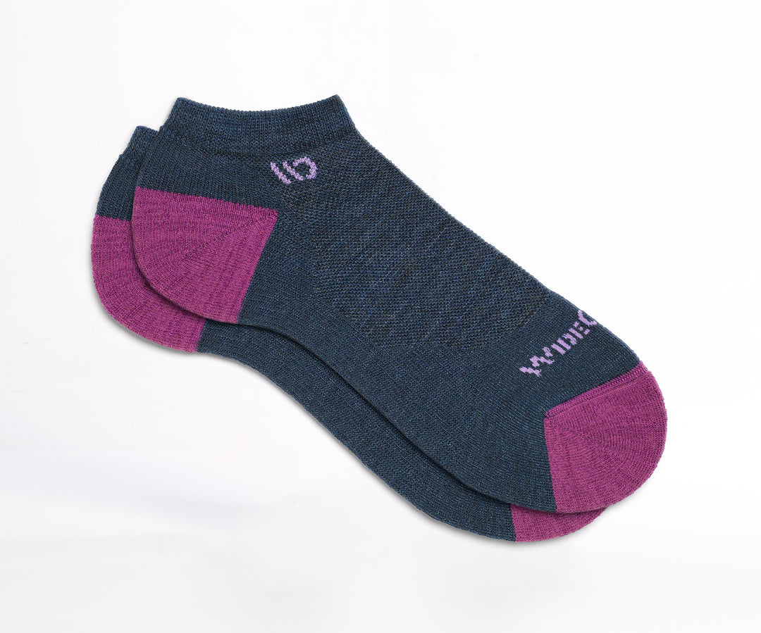 Flat socks featuring fuchsia heel/toe, lavender logo, and denim body --Denim
