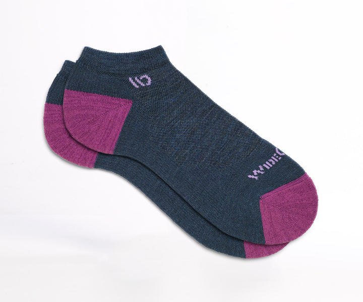 Flat socks featuring fuchsia heel/toe, lavender logo, and denim body --Denim