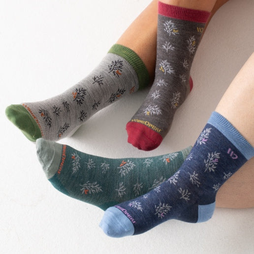 Shop Fun Socks - feet wearing blue socks with strawberries on them