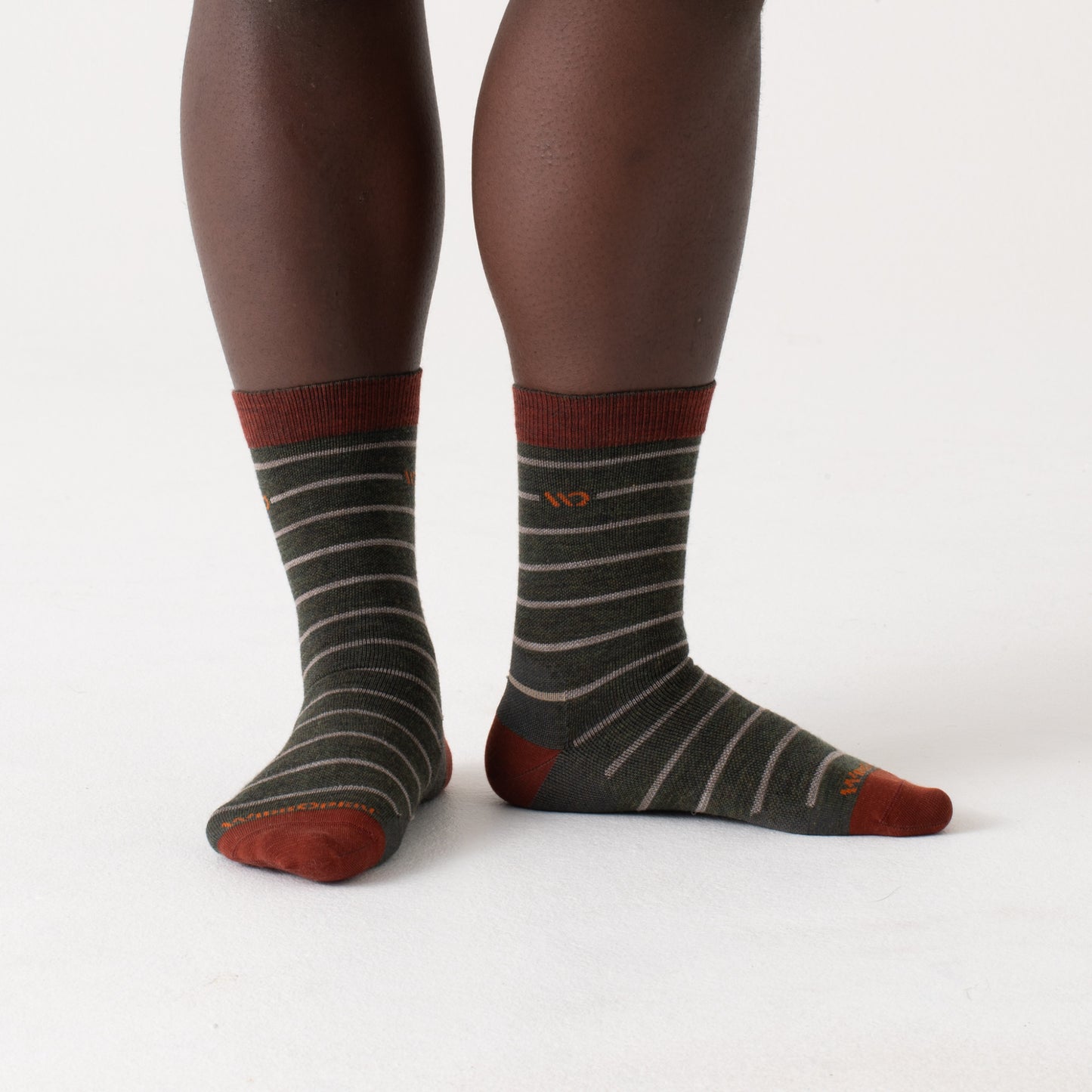 On body socks with maroon heel/toe, orange logo, forest body and gray stripes --Forest