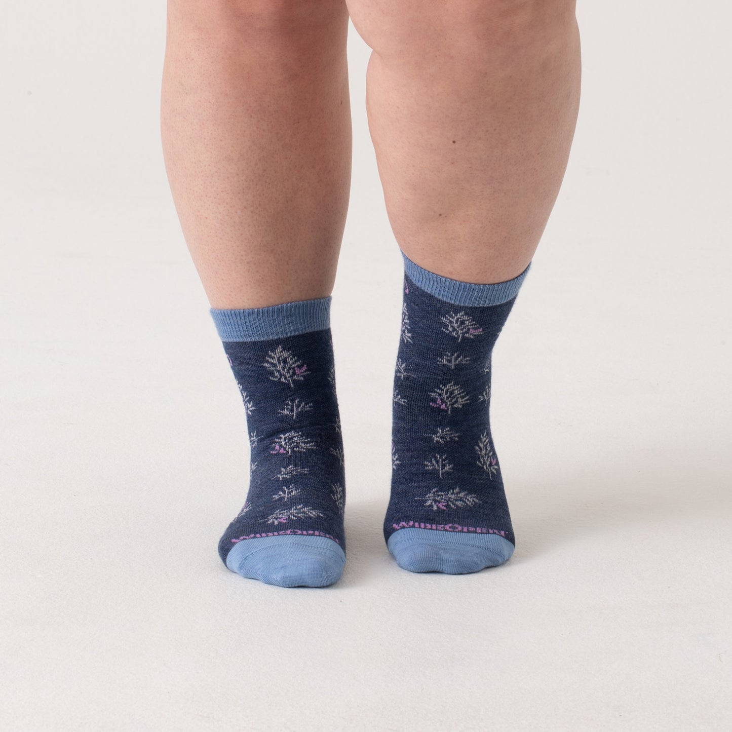 Micro Crews on model with light blue heel/toe/cuff, Denim body and white design --Denim