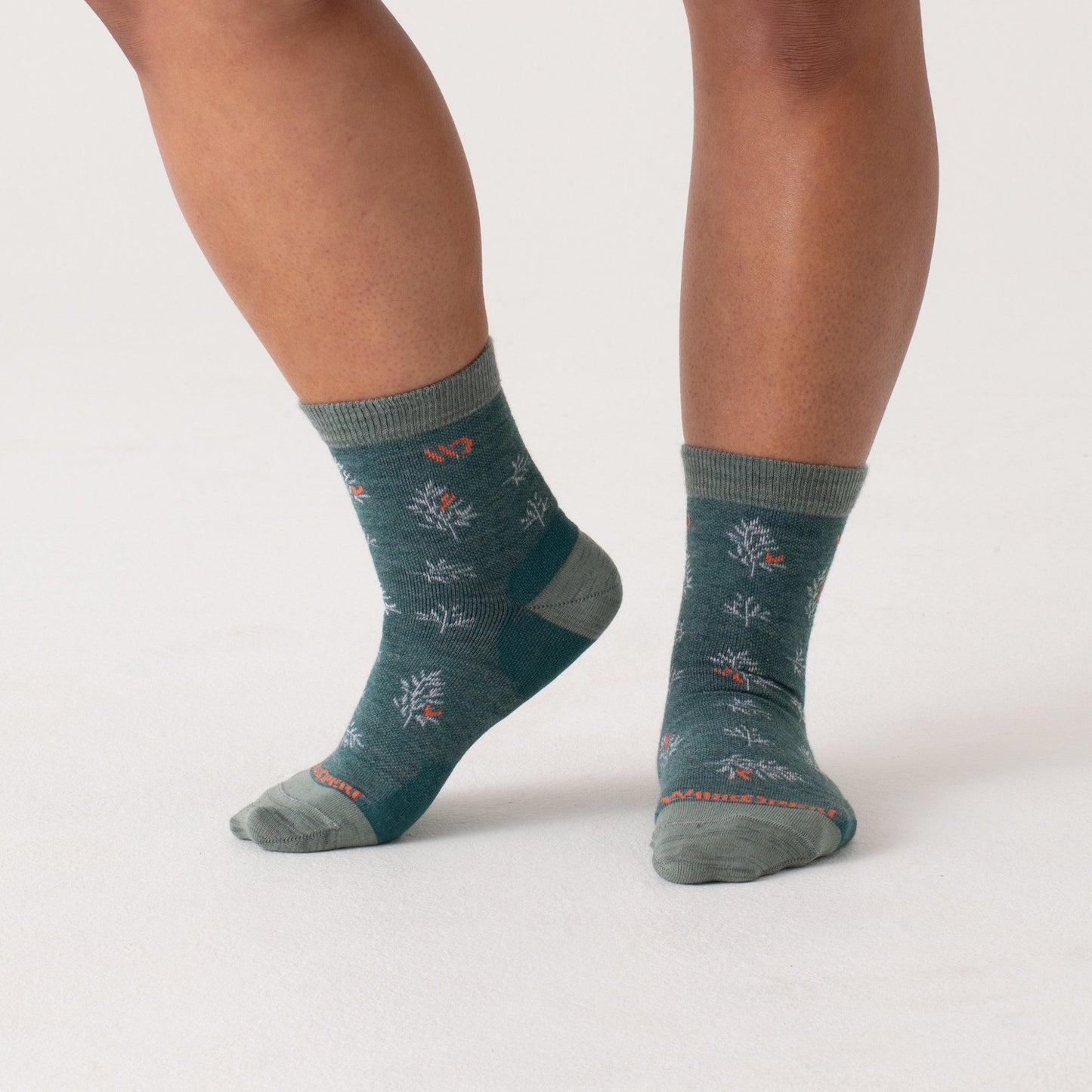 On body of seafoam heel/toe/cuff, teal body, white pattern with orange accents --Light Gray/Teal/Denim/Taupe