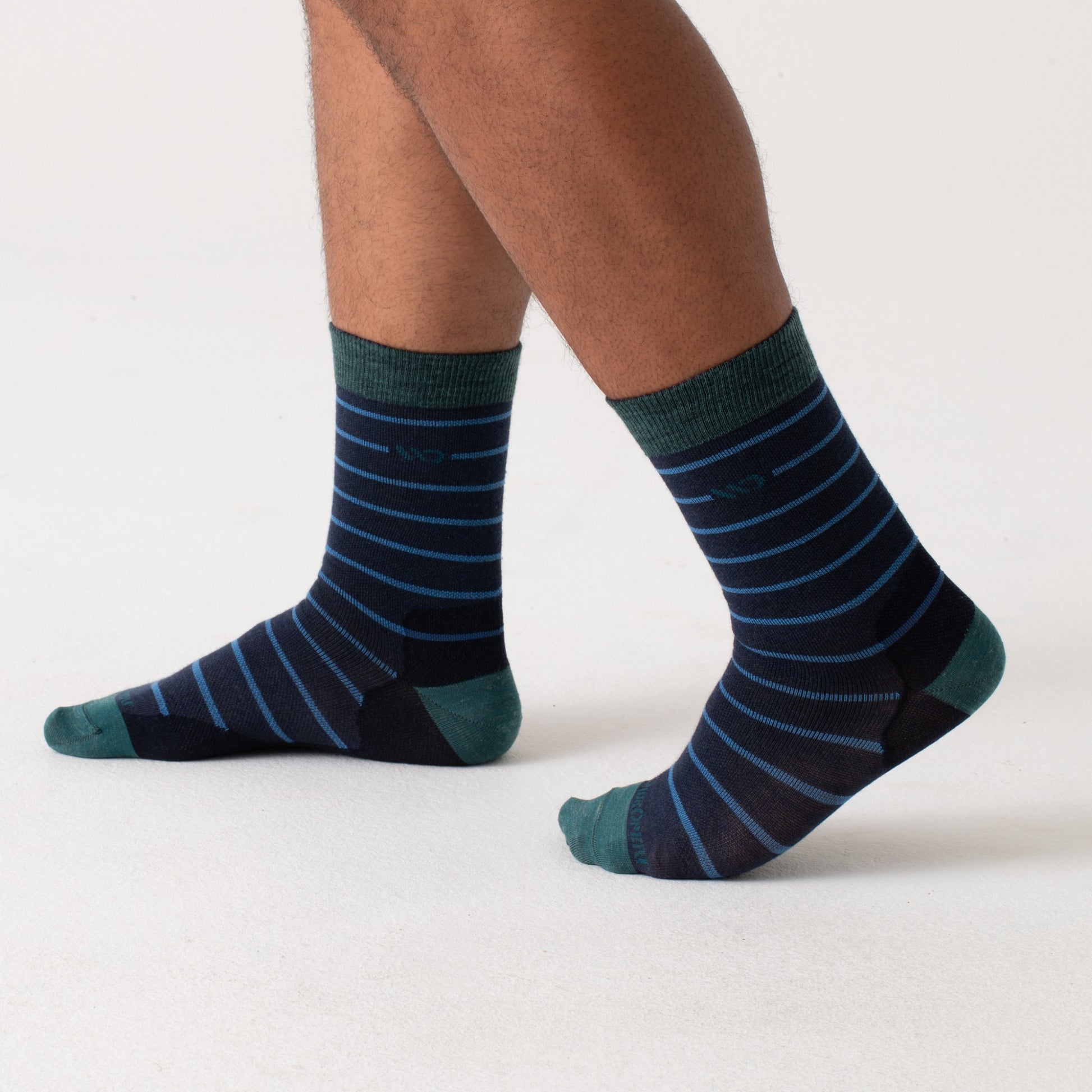 Crew sock with dark teal heel/toe and logo, denim body and blue stripes --Denim