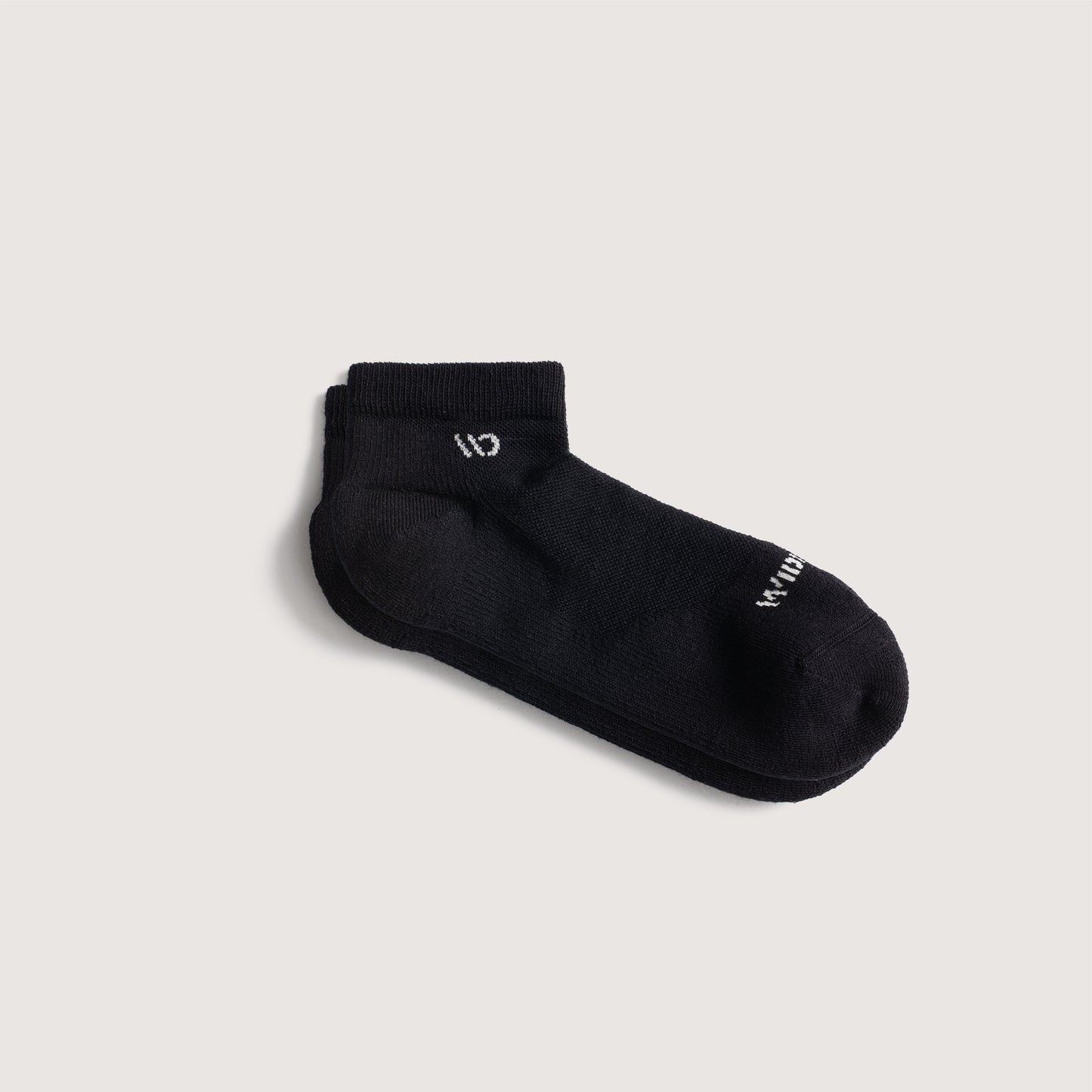 Flat socks, featuring white logo, with Black body --Black