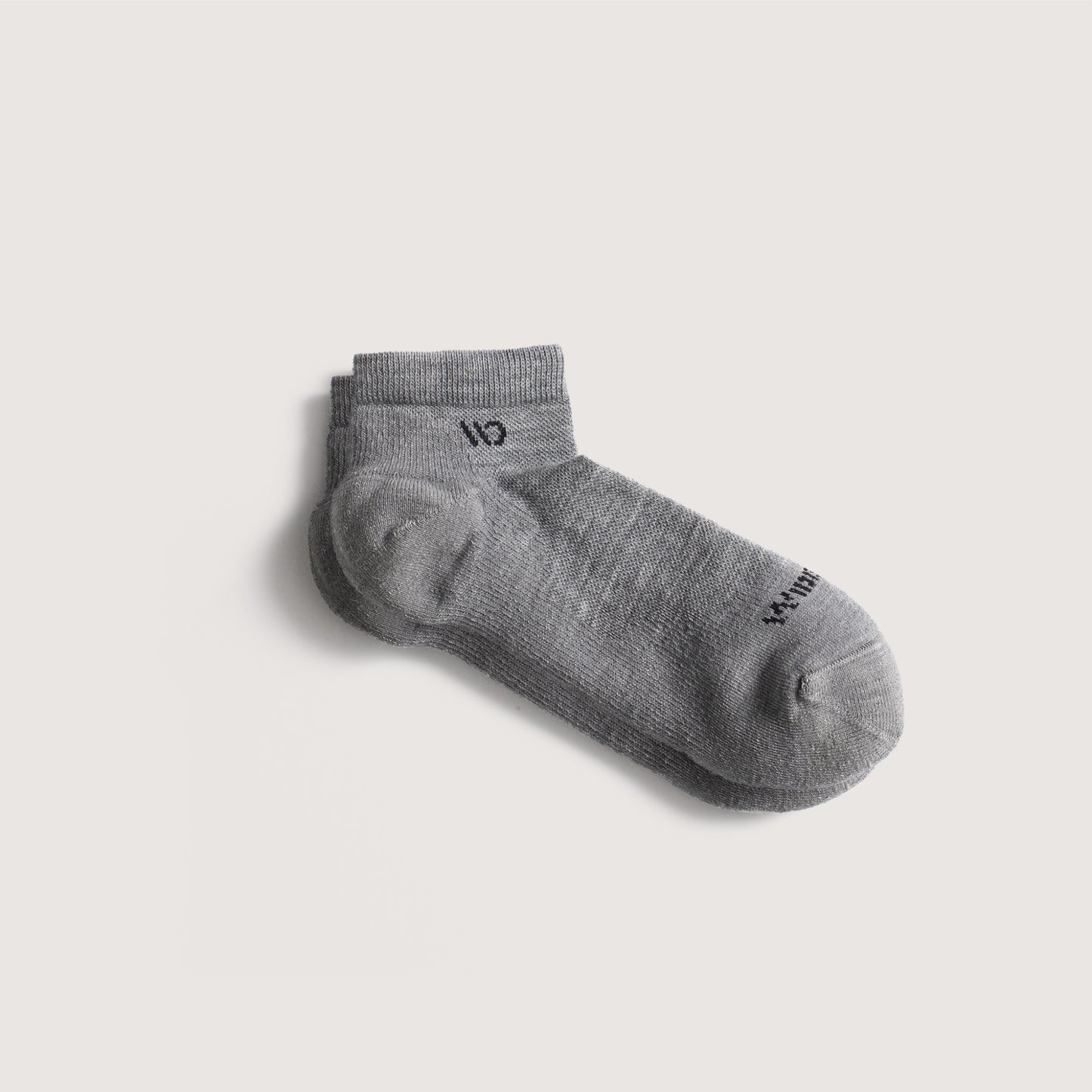 Flat socks, featuring black logo, with light gray body --Light Gray