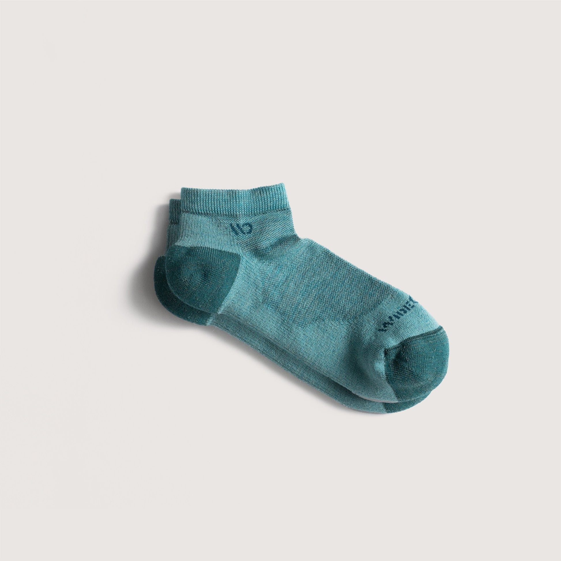 Flat socks featuring teal heel/toe and logo, with light teal body --Light Teal/Denim/Taupe