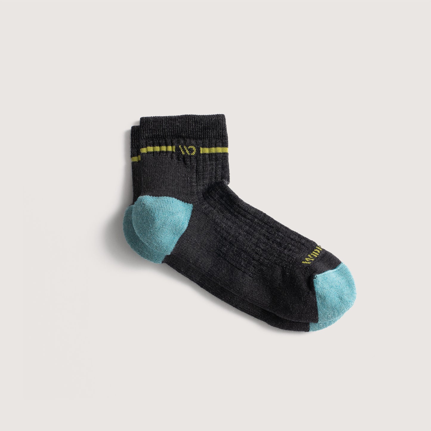 Socks with aqua toe, yellow logo, charcoal body, and yellow stripe below cuff--Charcoal