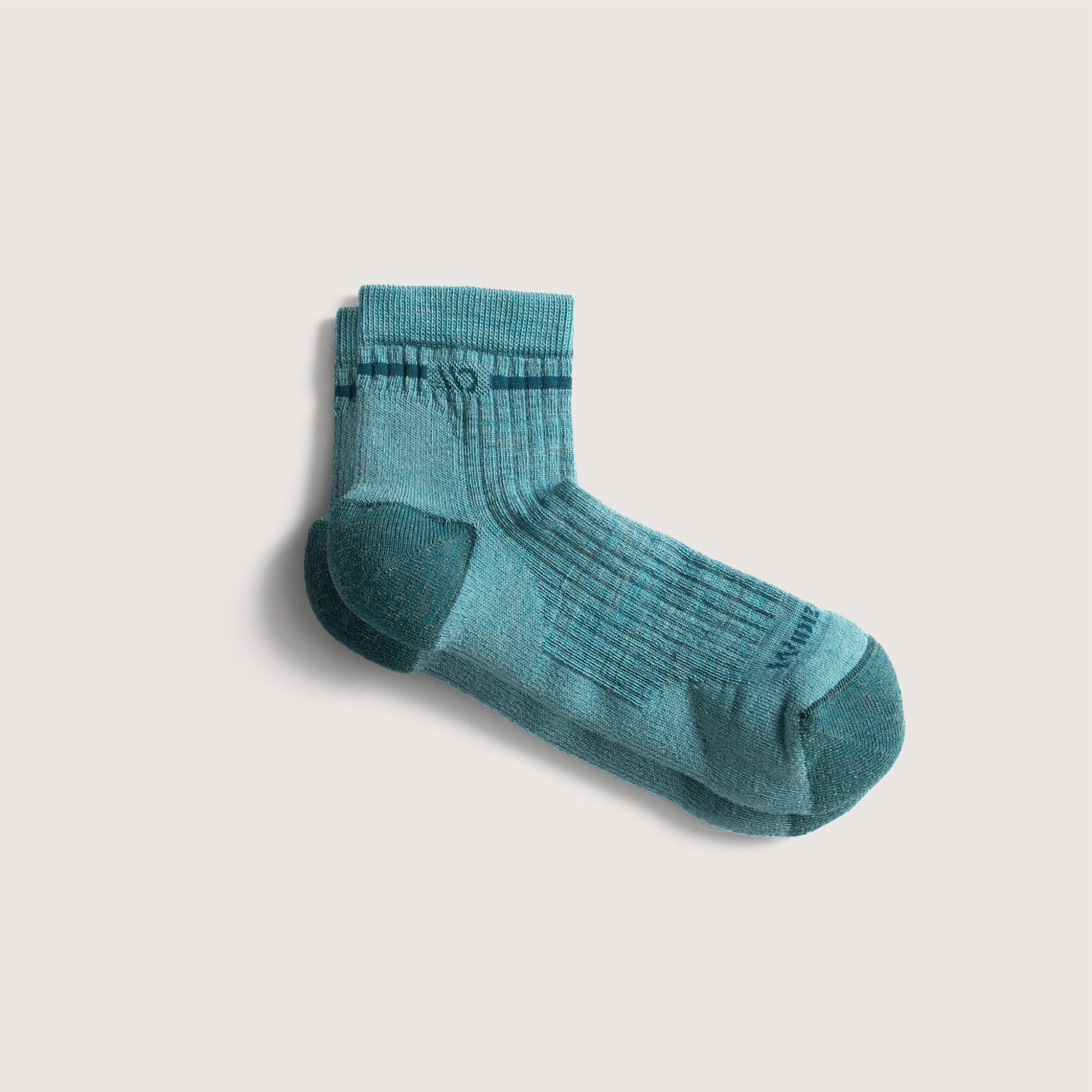 Flat socks featuring teal toe, light teal body, teal logo and stripe under the cuff--Light Teal