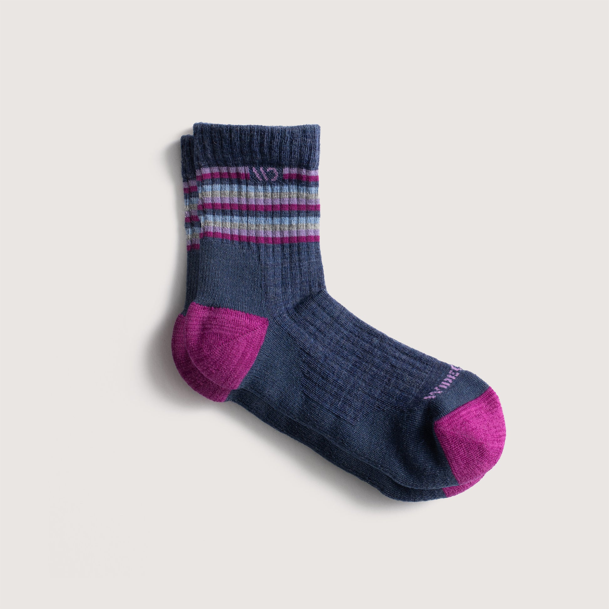 Socks featuring fuchsia heel/toe, lavender logo, denim body, and stripes on cuff --Denim