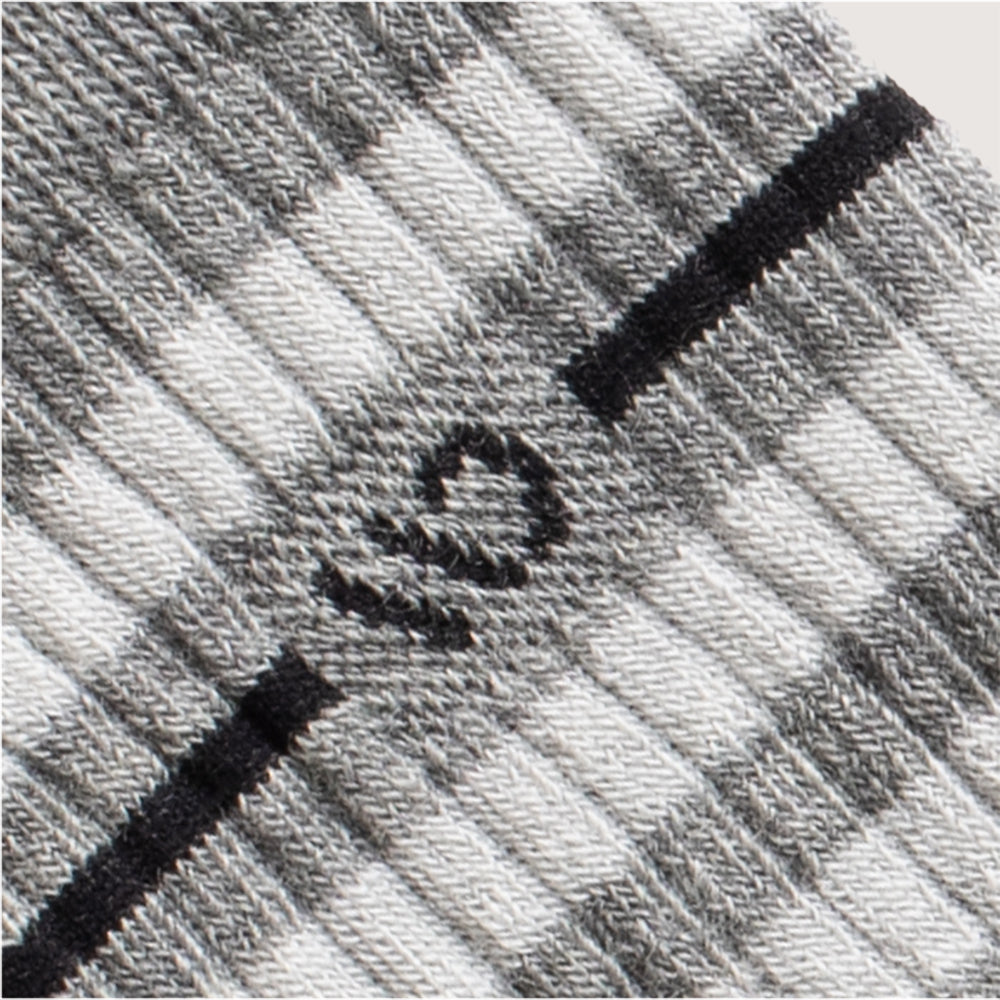 Detail featuring a black logo and stripe, with wider white and gray stripes--Light Gray