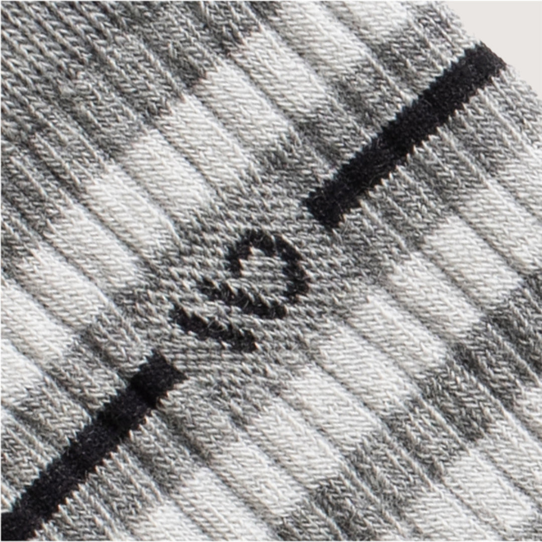 detail image of 9002 Light gray, featuring a black logo and stripe, with wider white and gray stripes