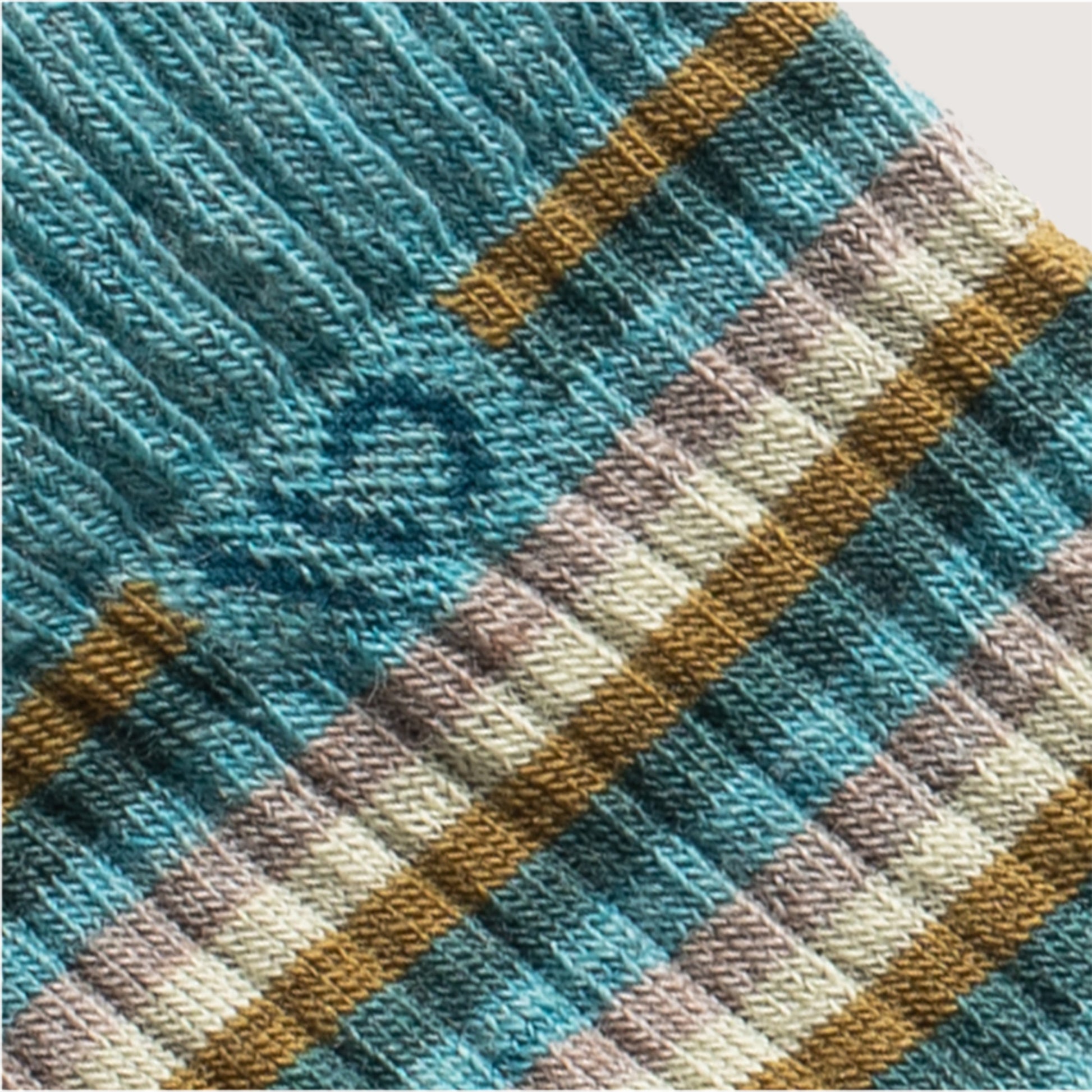 Detail featuring an aqua logo and yellow, cream, gray and light teal stripes --Light Teal