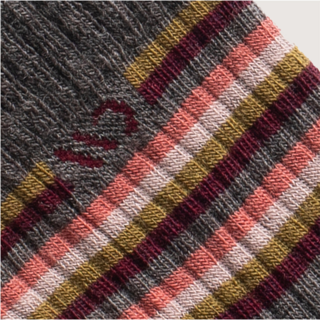 detail image of 9502 taupe, featuring a maroon logo and white, pink, yellow and maroon stripes 