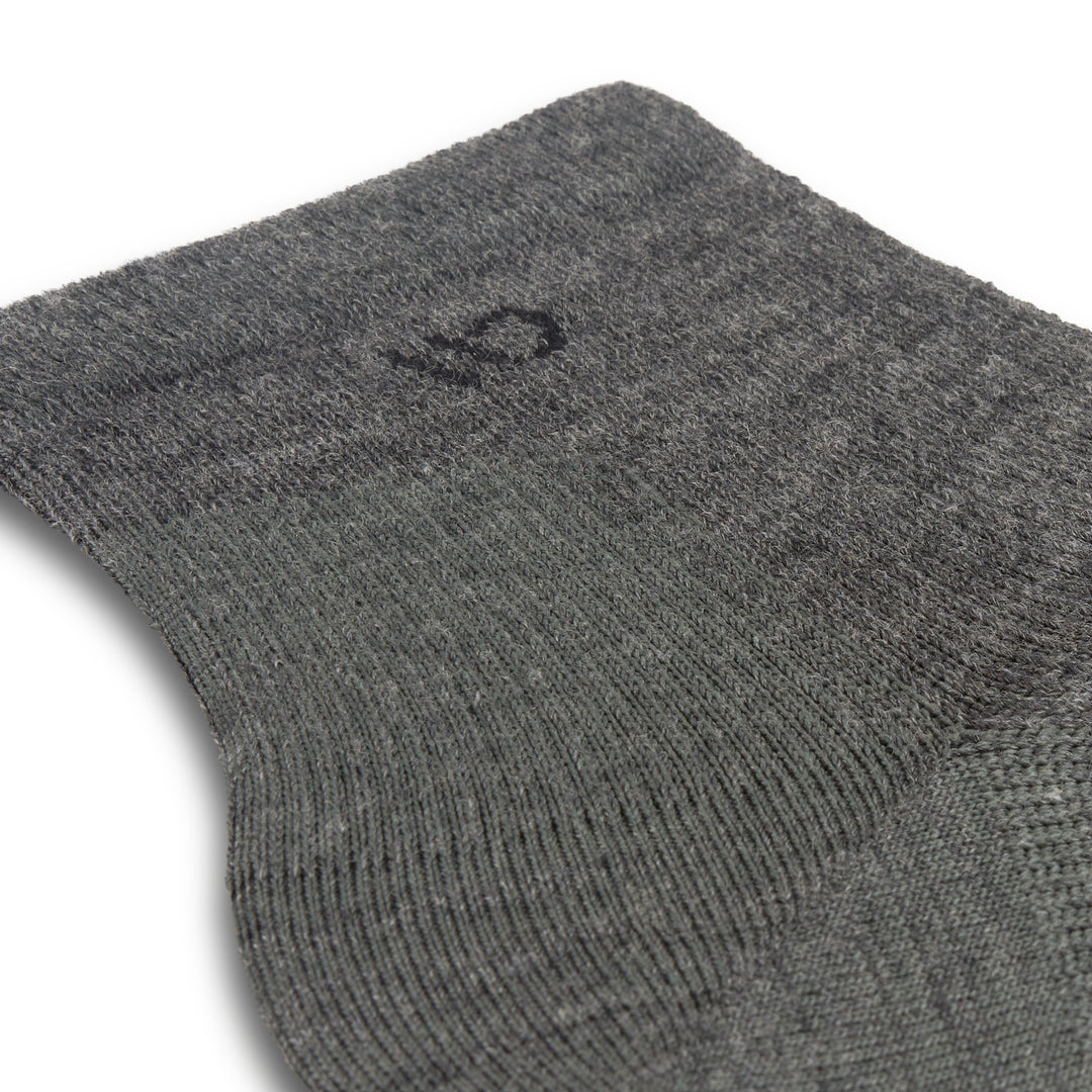 Close up detail image of the ankle on the 9014 solid lightweight quarter sock in gray