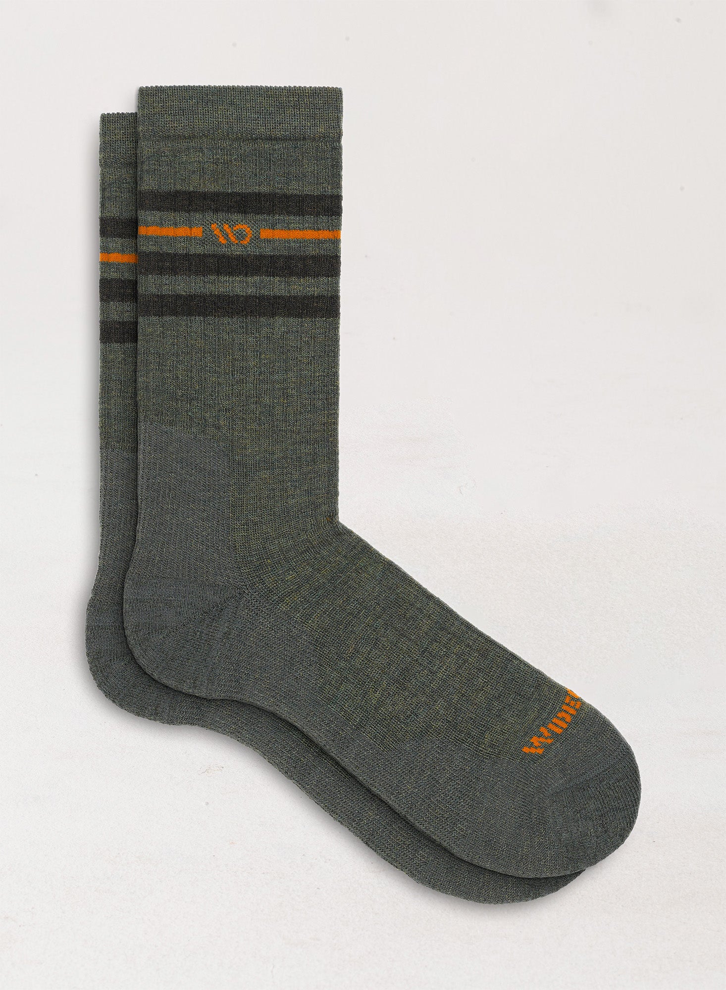 Flat socks orange logo, forest green body, and black stripes below the cuff --Forest