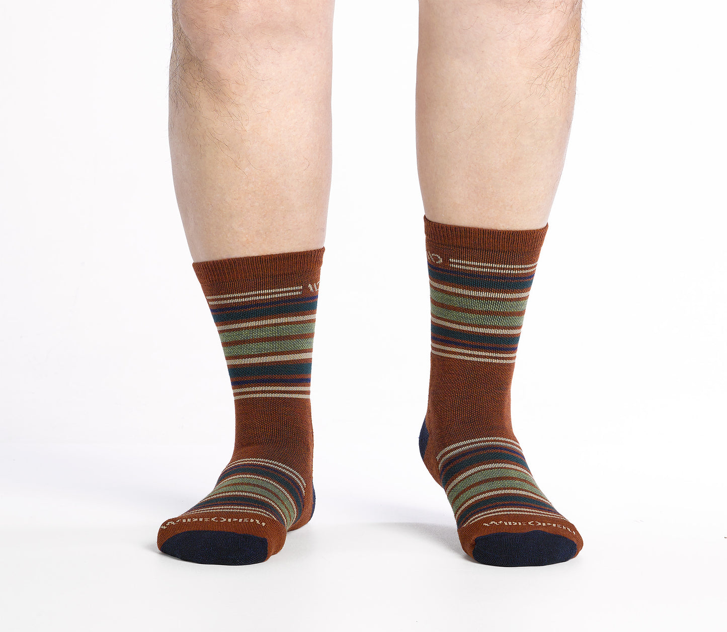 On body Micro Crew sock with dark heel/toe and Cream logo, Rust body and blue and green  stripes.