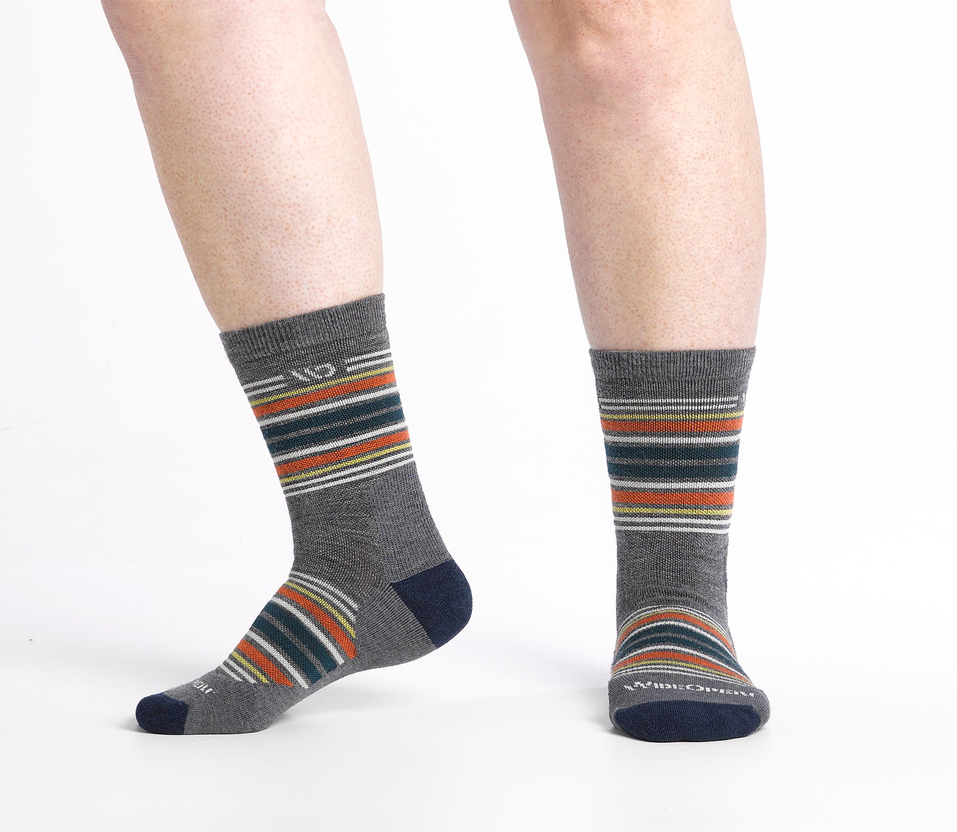 side view n body Micro Crew sock with Navy heel/toe and Cream logo, Gray body and blue and orange stripes.