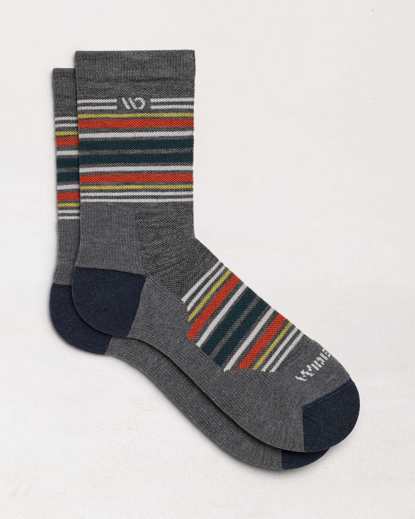 Socks laying flat with  stripes on the cuff and over the top of the foot with gray body and white logo--Gray