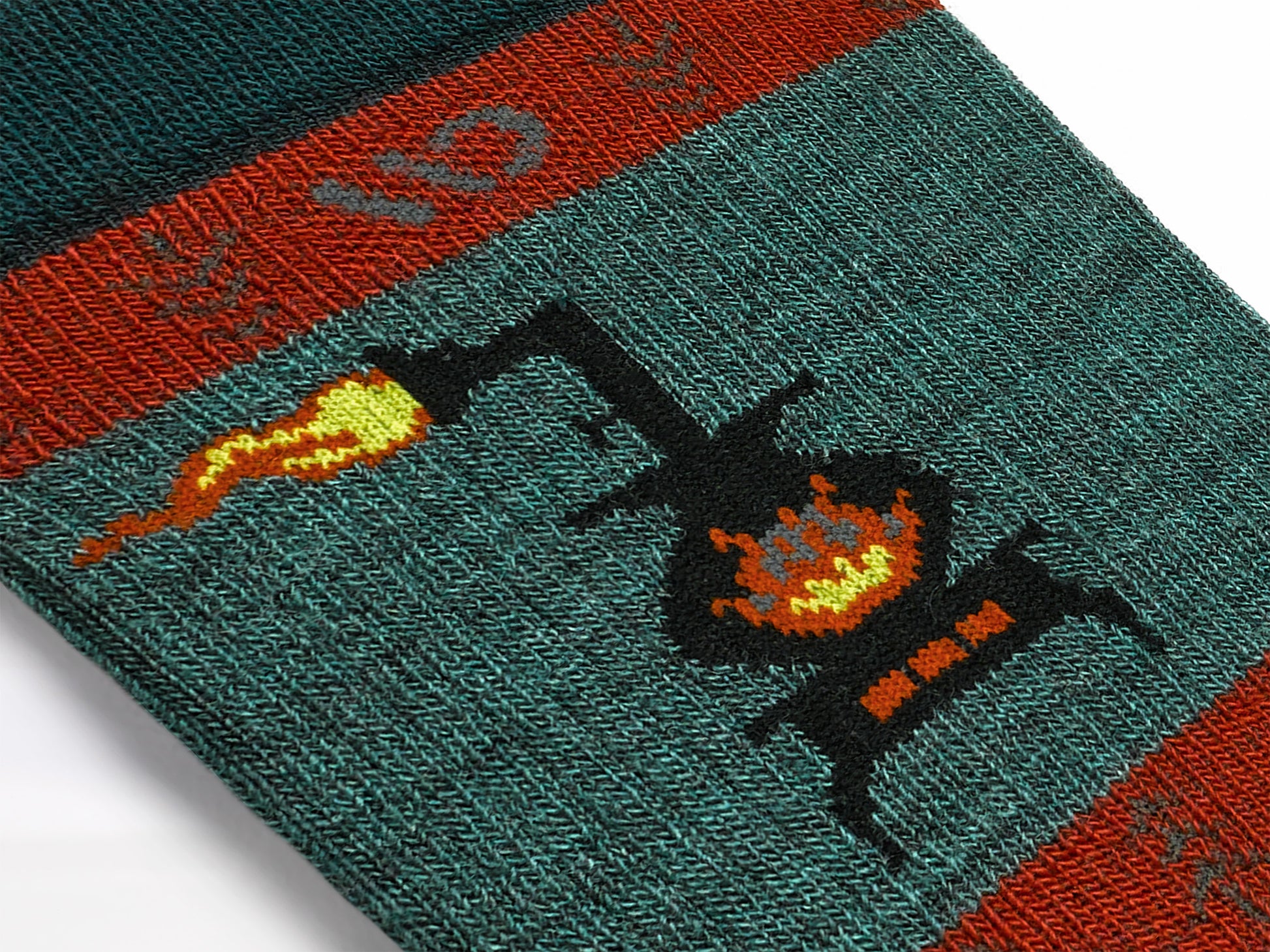 detail image of the cuff on the stoked crew sock showing the logo and the ankle design