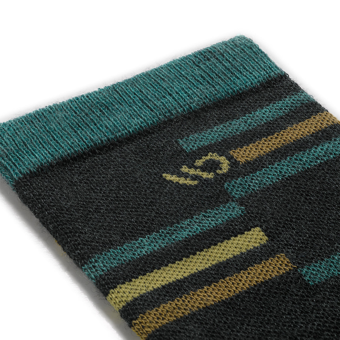 Detail image of the 9010 mens crossroad cushioned crew in Charcoal close up of cuff with teal and yellow stripes 