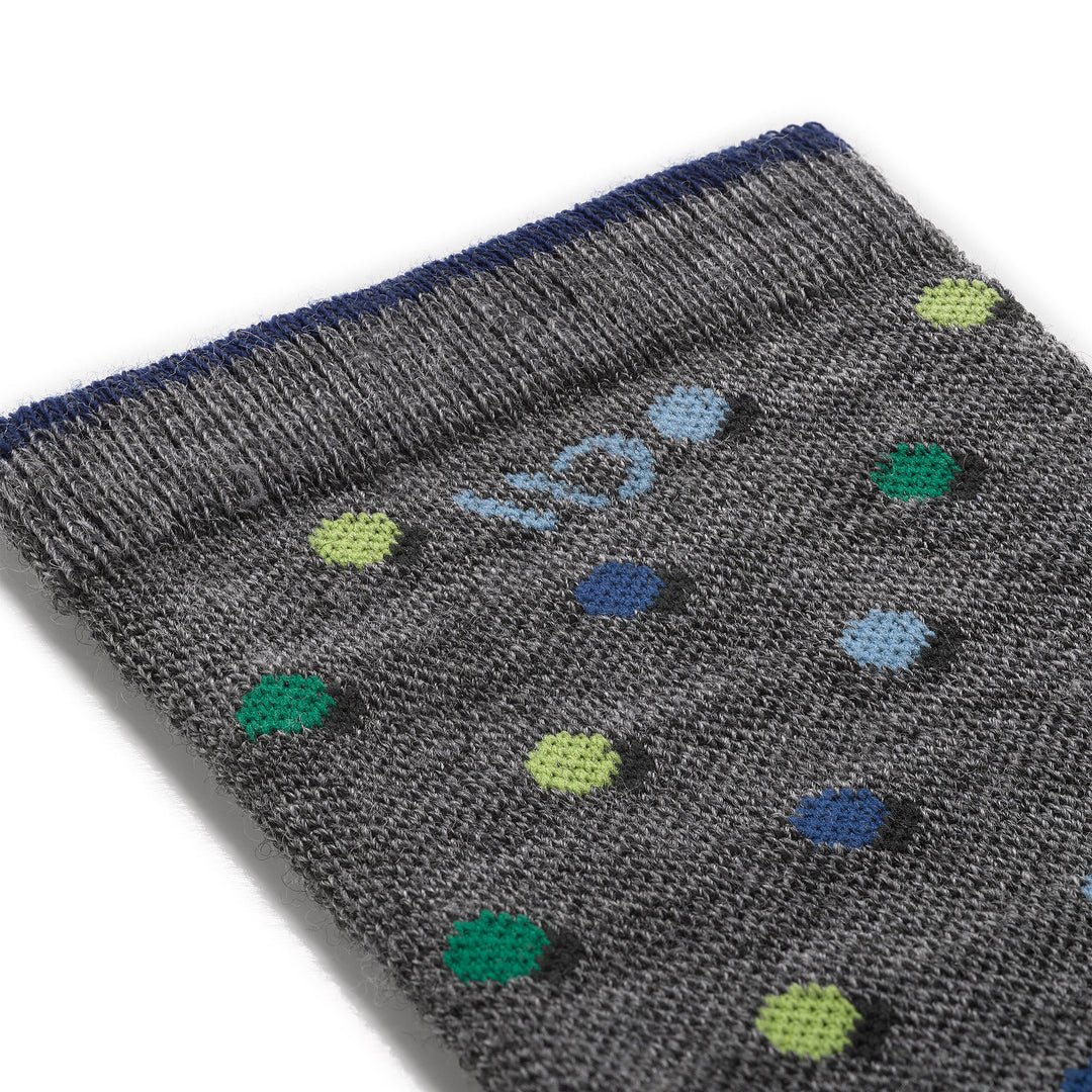 Detail image of mens on the dot cushioned crew 9011 in gray close up of cuff featuring yellow, blue, green dot on gray sock