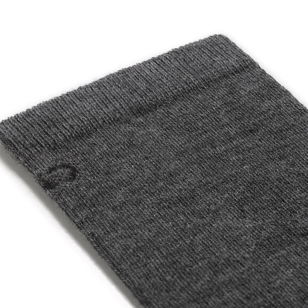 detail image of the 9012 solid lightweight crew in gray featuring black logo on gray body 