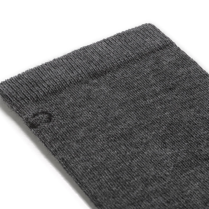 detail image of the 9012 solid lightweight crew in gray featuring black logo on gray body 