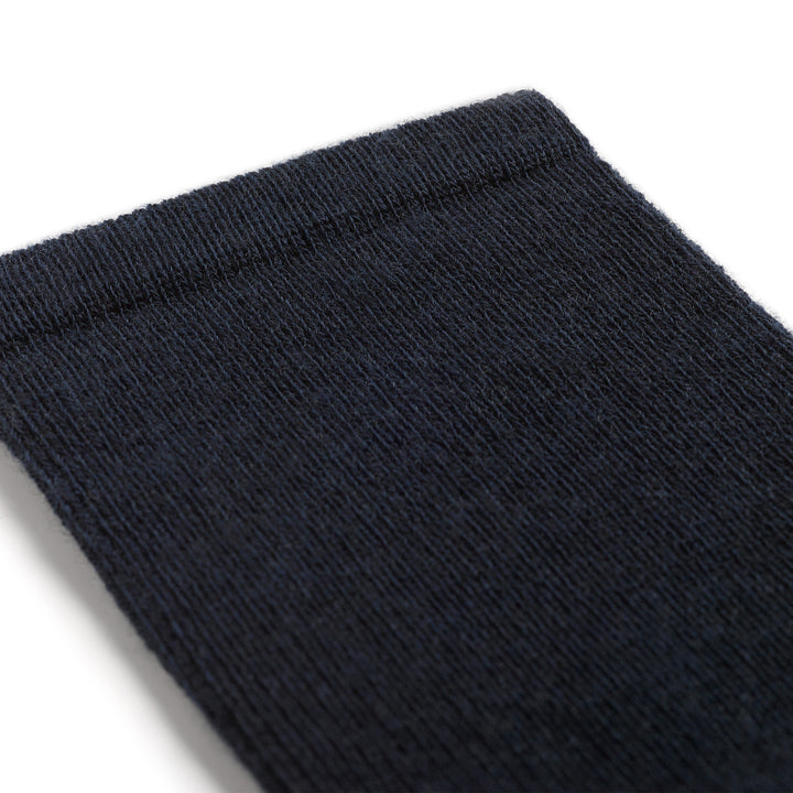 9017 Solid Cushioned knee high in Navy detail image close up of solid navy cuff