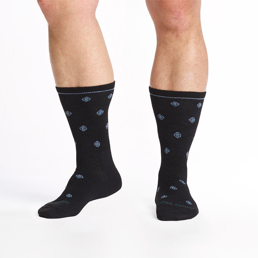 9018- Black crew socks with Blue logo, gray geometric dots and shown from the front and side 