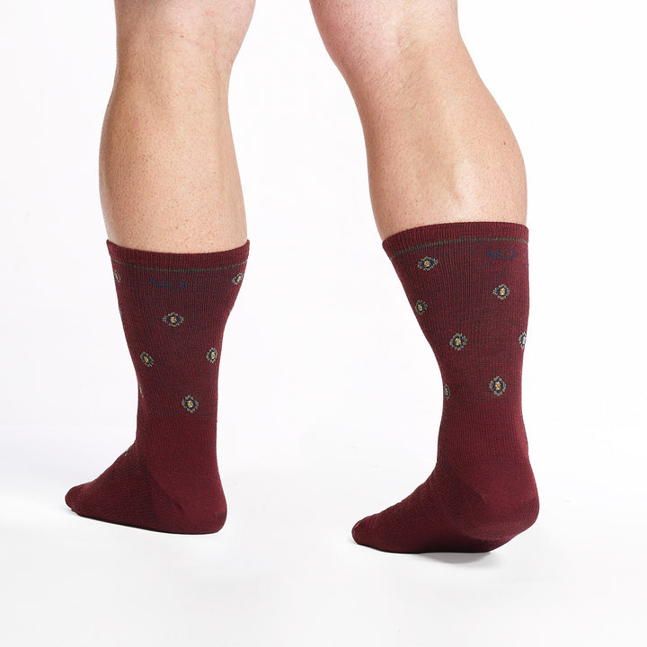 9018 burgundy crew sock with blue logo, taupe geometric dots shown from behind 