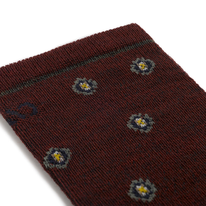 9018 Men's geometric lightweight crew in burgundy detail image up close of the dot design on a burgundy cuff