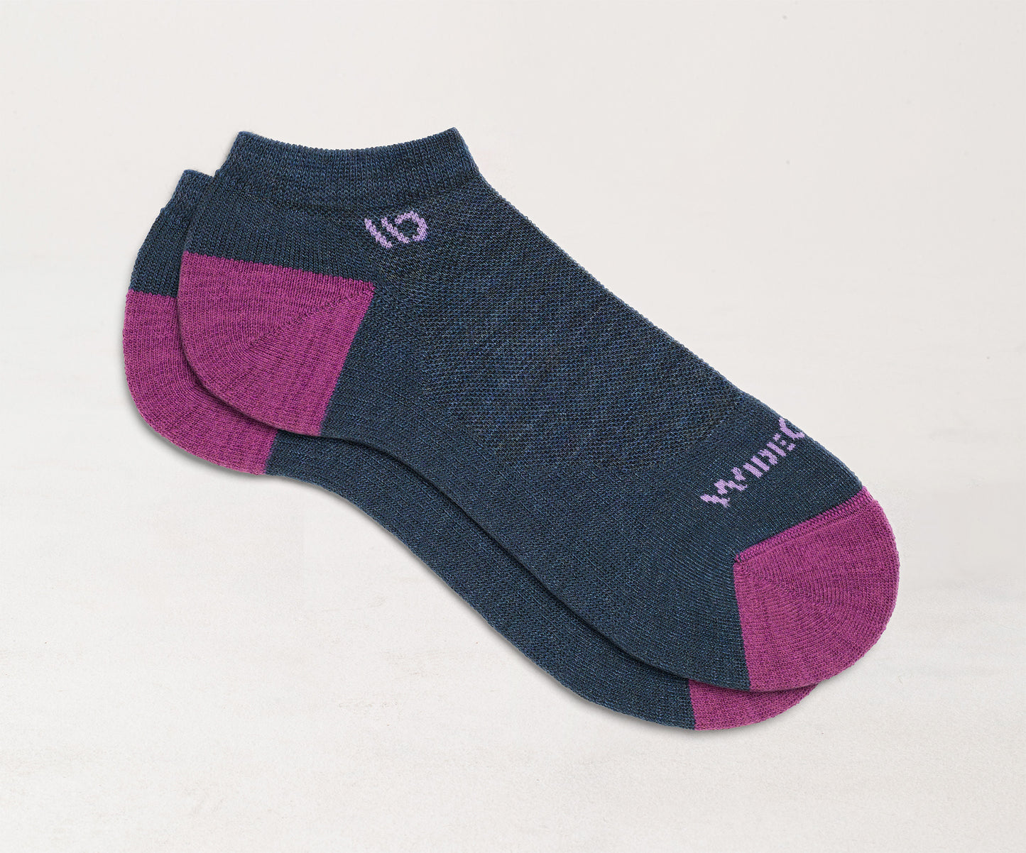 Flat socks featuring fuschia heel/toe, lavender logo, and denim body --Denim