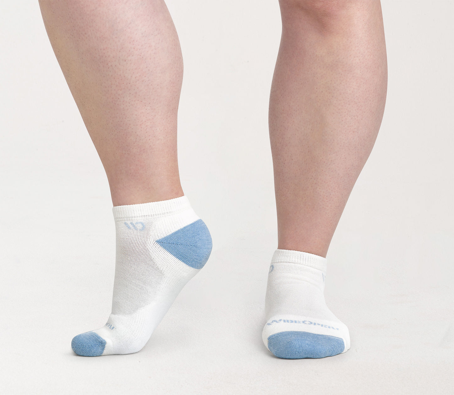 On model: No Shows with blue heel/toe and logo, with white body--White