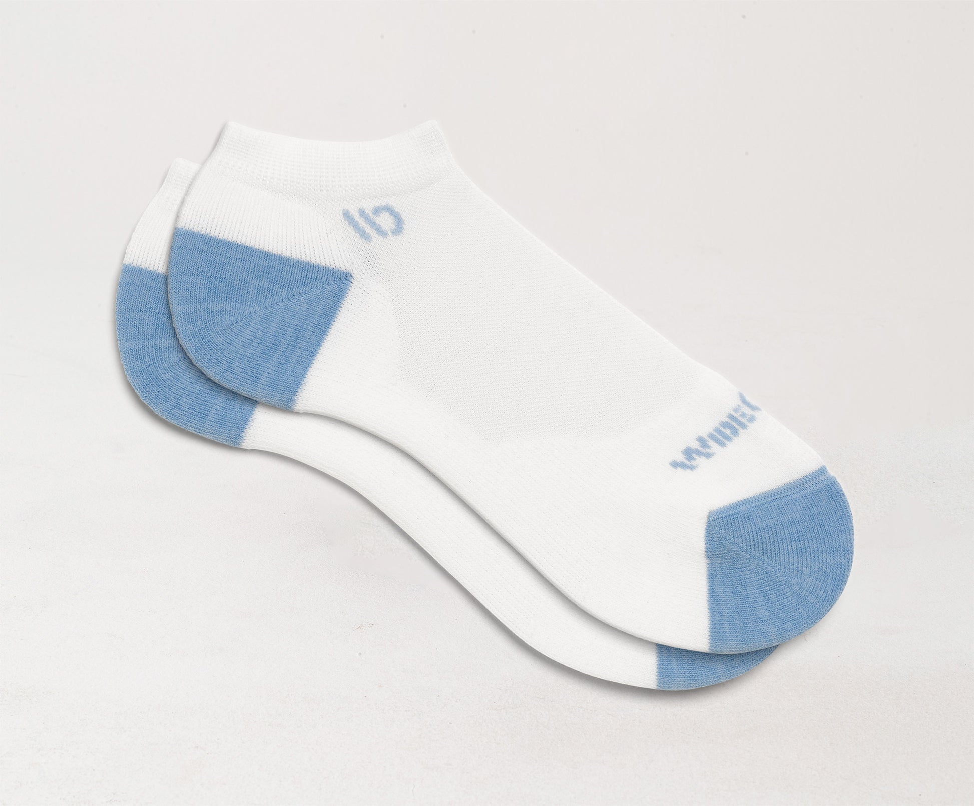 Flat socks featuring blue heel/toe and logo, with white body--White