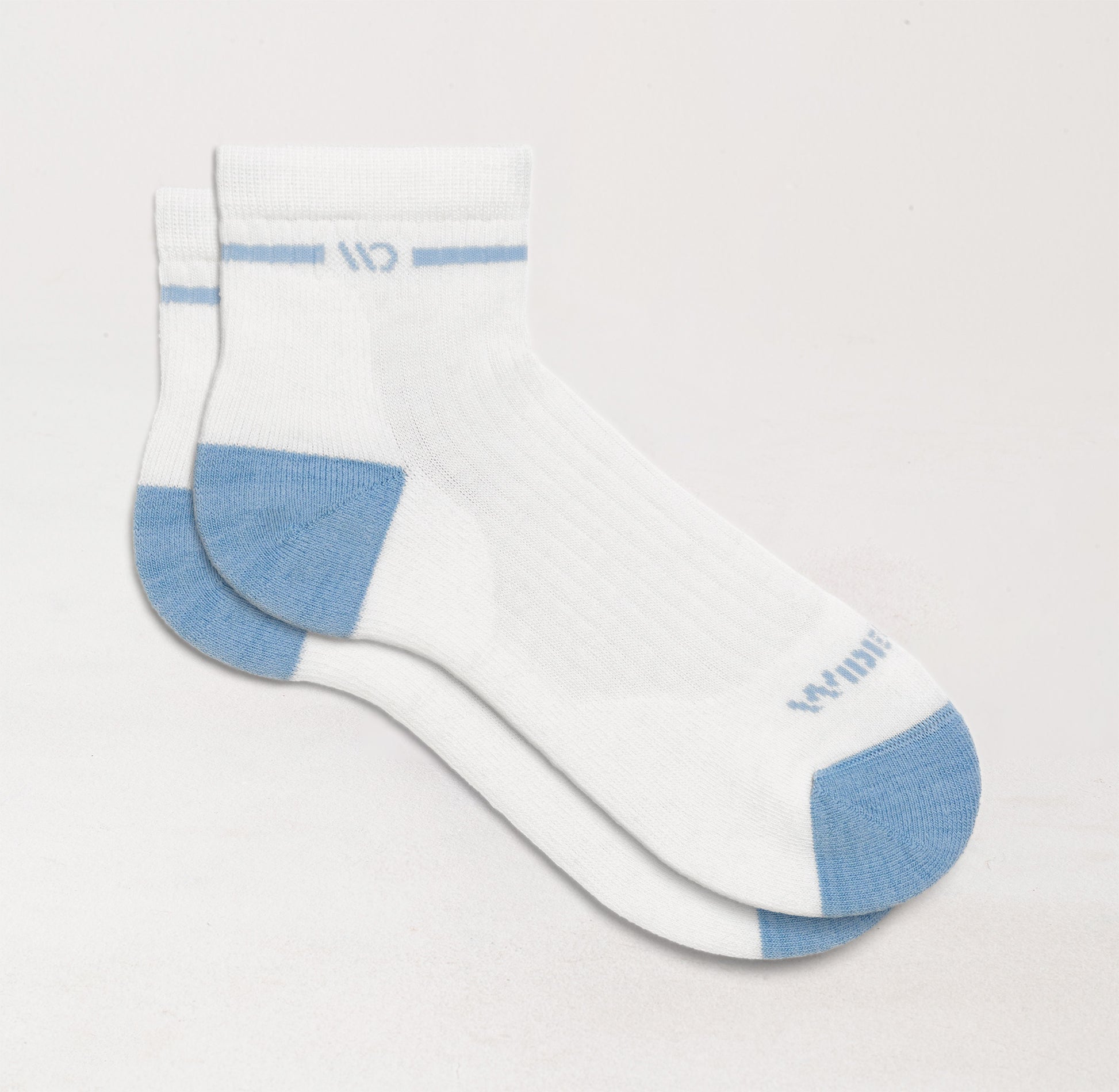 Flat socks with blue heel/toe, white body, and blue logo and stripe under the cuff--White