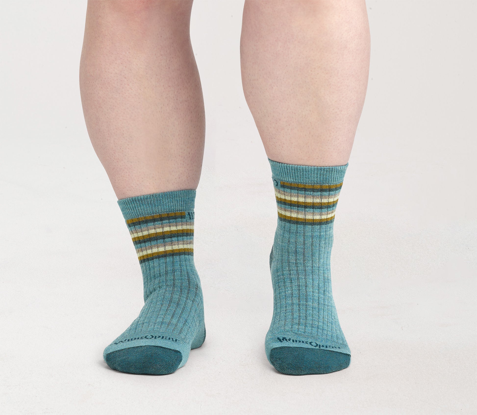 On model Micro Crews: dark teal toe, light teal body and stripes below cuff --Light Teal