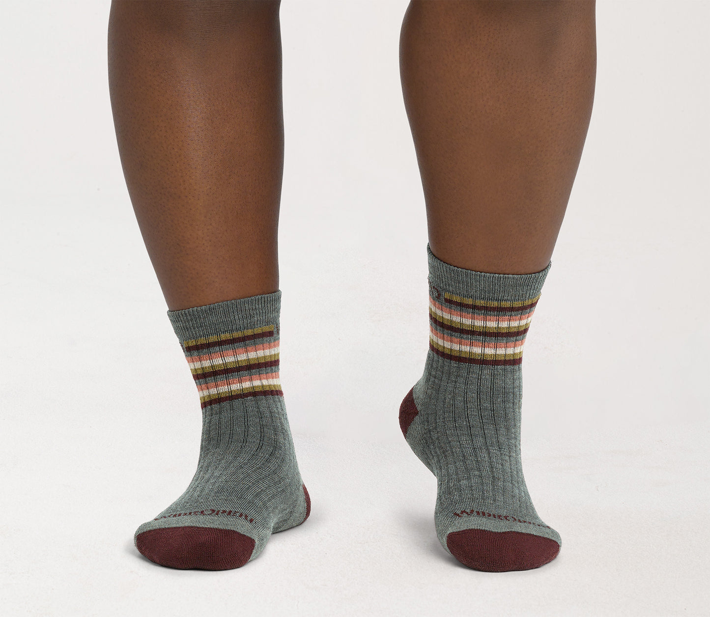 On model Micro Crews: maroon heel/toe, taupe body with Stripes below the cuff --Taupe