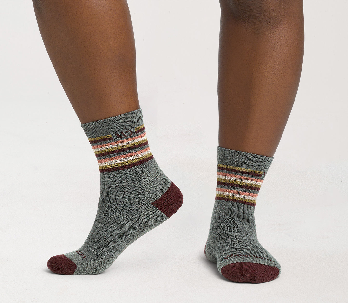 On model Micro Crews: maroon heel/toe, taupe body with Stripes below the cuff --Taupe