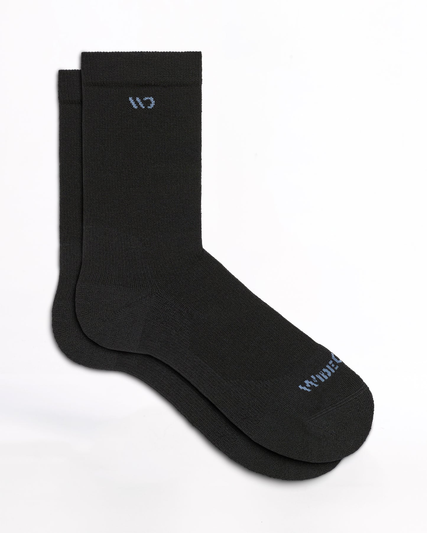 Flat socks featuring light blue logo, and black body