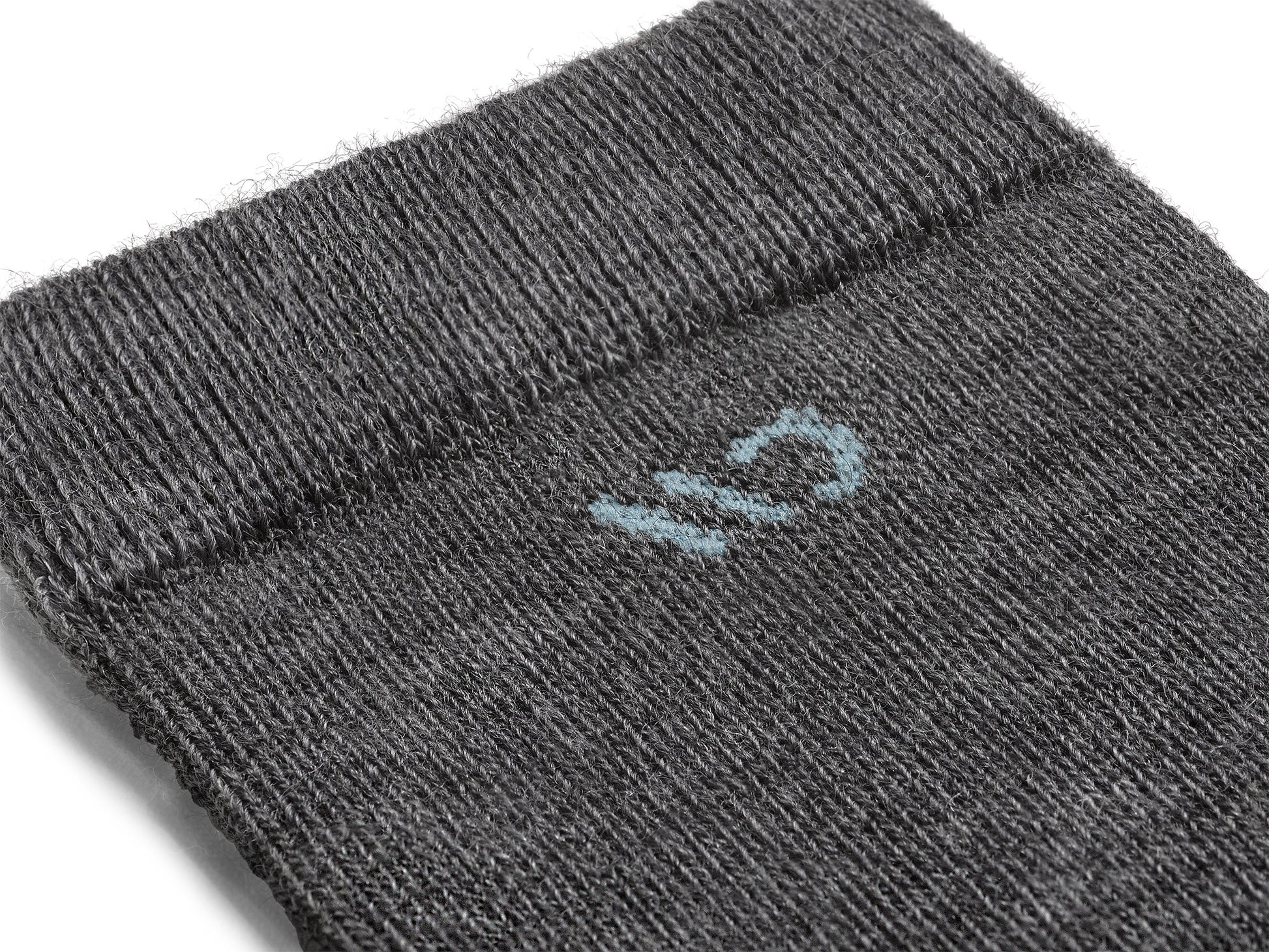 Detail featuring a light blue logo and gray body