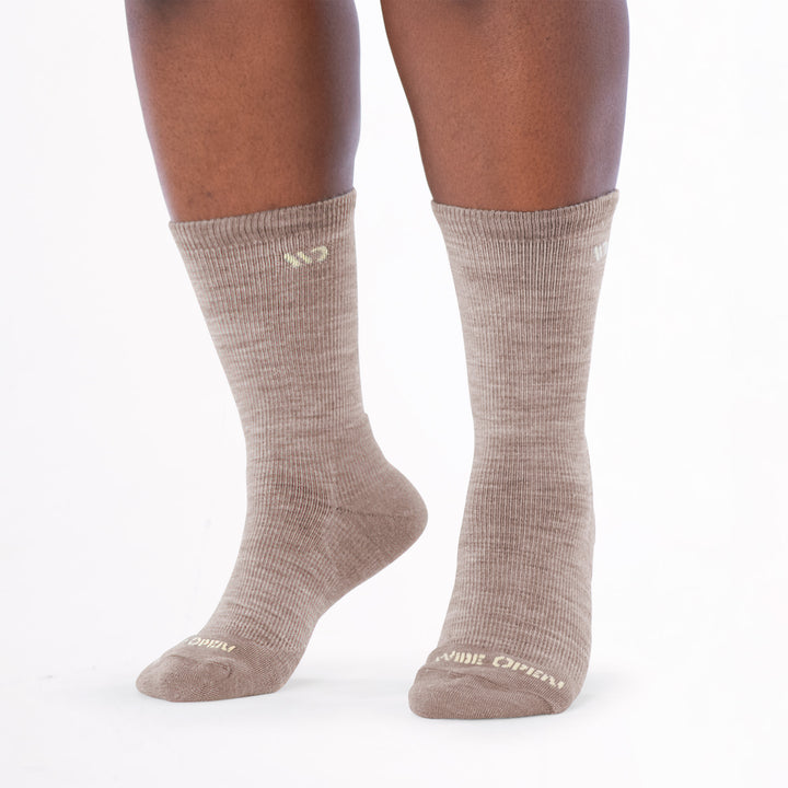 Model image standing on toes wearing the 9504 IN rye colorway