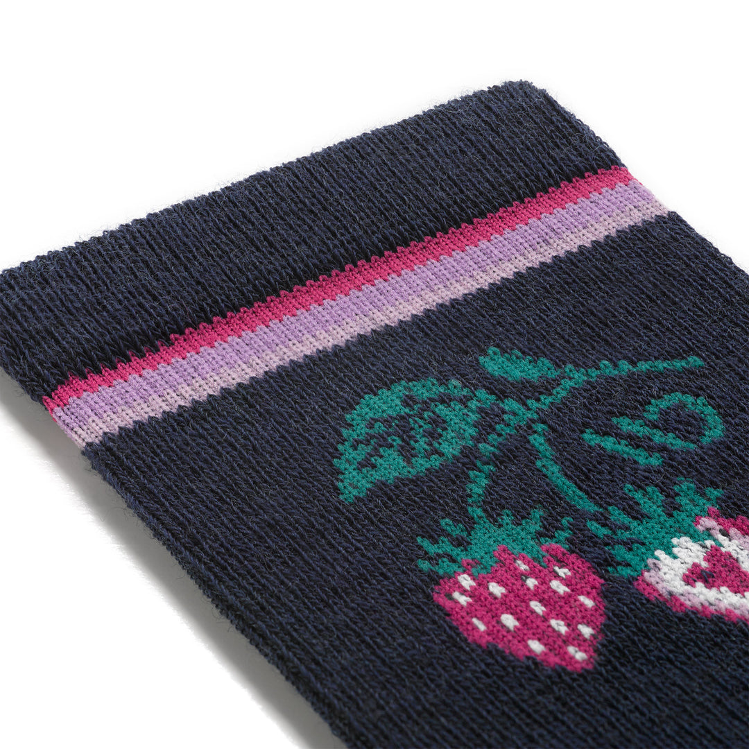 Detail swatch featuring a strawberry and vine on with stripe on cuff