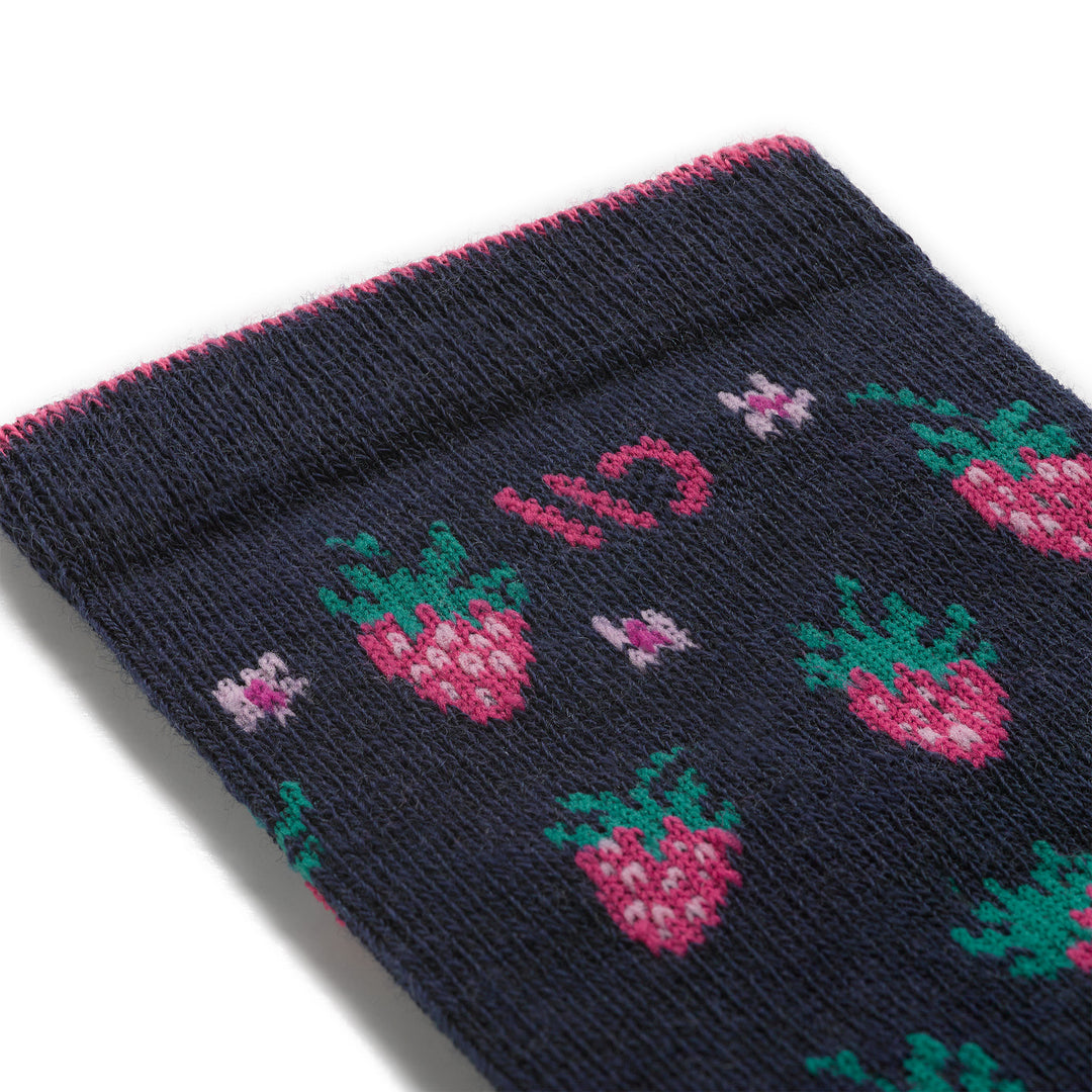 close up detail swatch of the strawberry fields cushioned crew featuring strawberries all over design