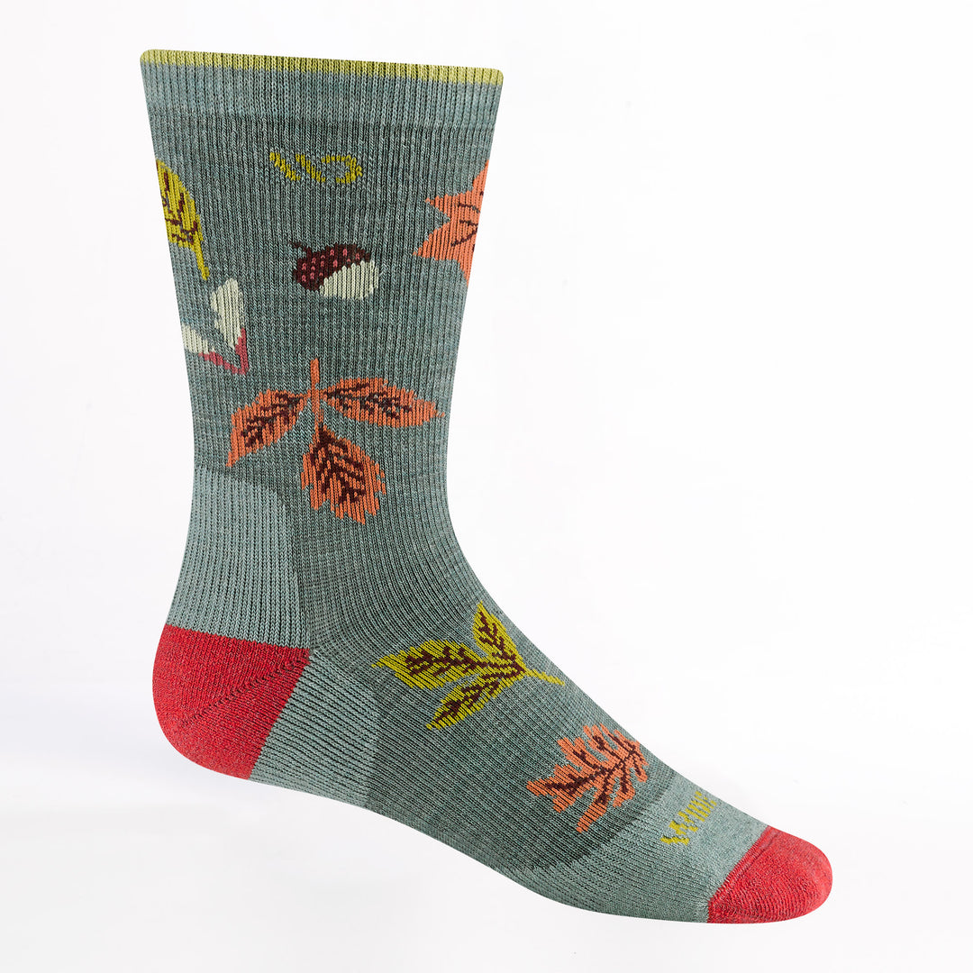 women's fall in love cushioned crew in seafoam colorway featuring a red heel/toe and acorns and leaves all over