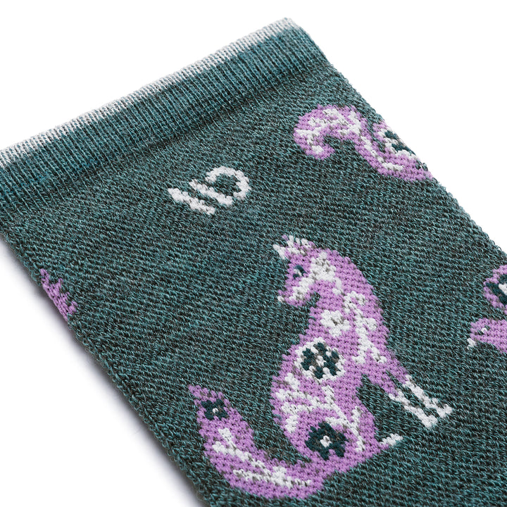 womens woodland wonder cuff in teal featuring a fox in lavender
