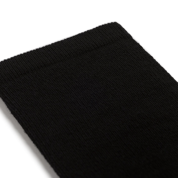 9517 Solid Basic Cushioned Knee high in black detail image up close of solid black cuff 